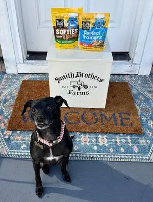Smith Brothers Farms Celebrates "National Dog Month" One Doorstep at a Time