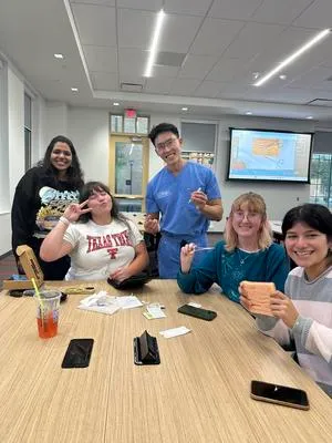 Dr. Thanapoom Boonipat Empowers Future Surgeons at Texas Tech Women in STEM Workshop